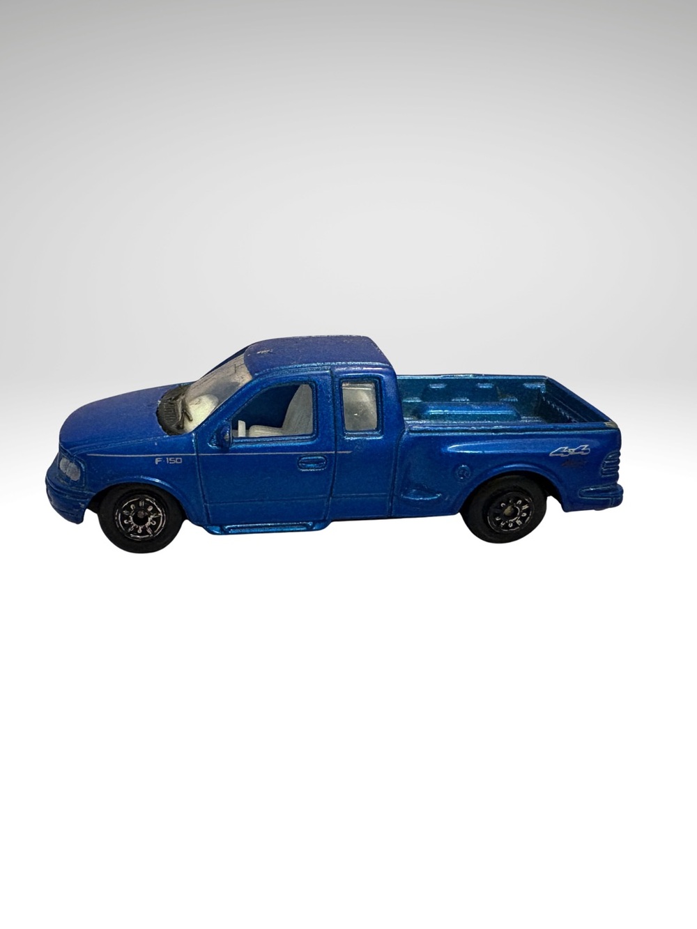 Welly 2000's Ford F150 Flare Side Super Cab Truck Diecast Blue (SKU: 232TO)